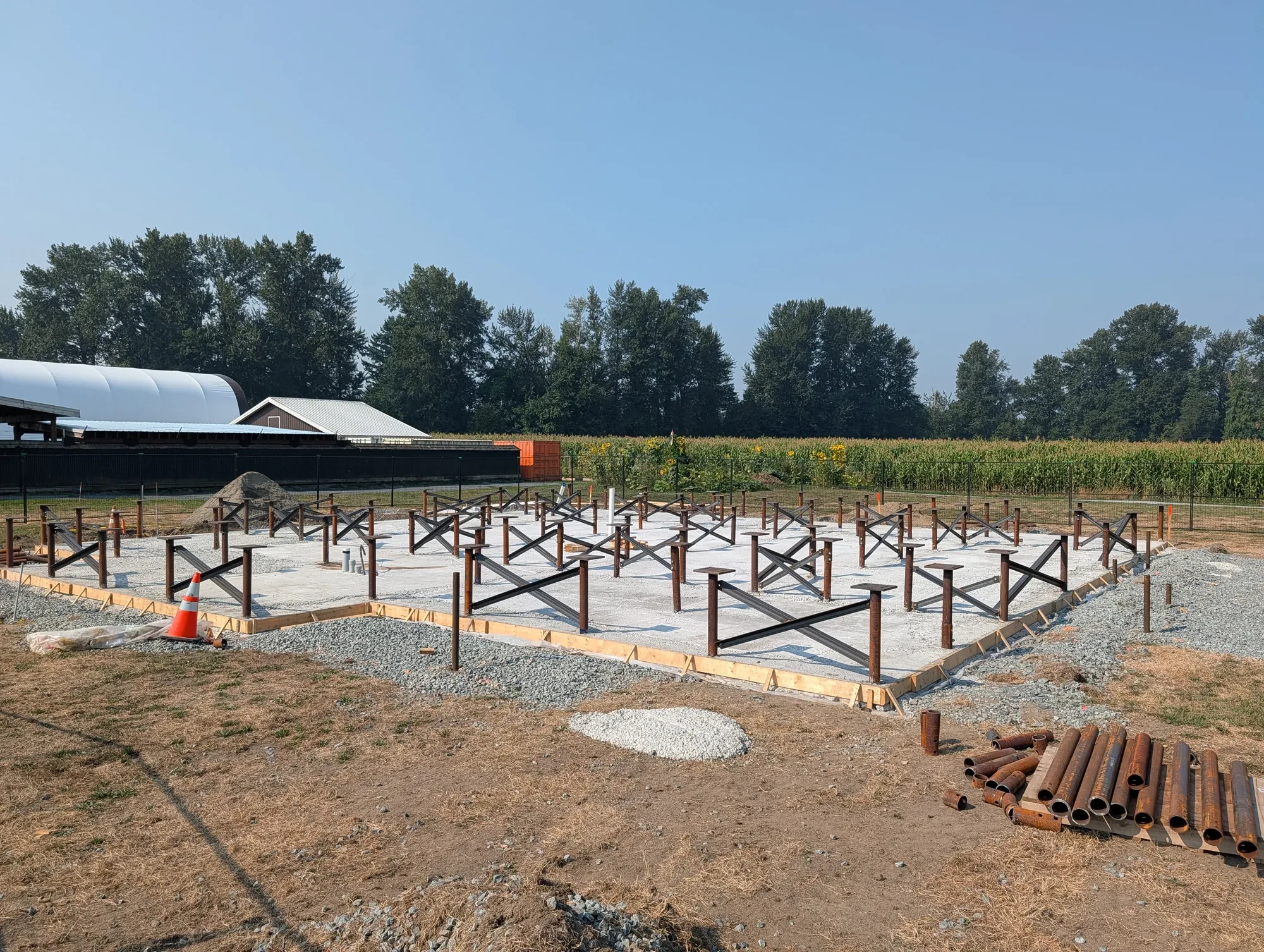 Office Building - All piles installed with pile caps welded on and cross-bracing welded in, as the engineering requires